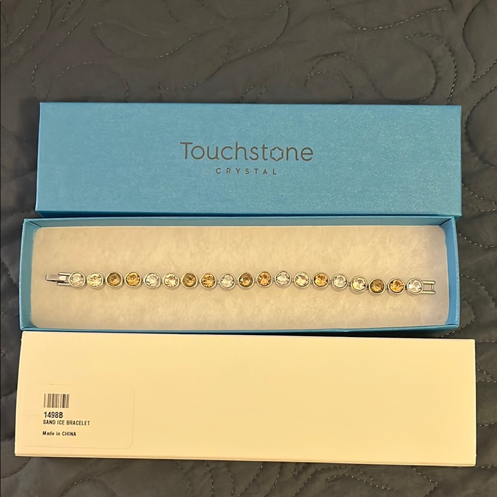 Touchstone Crystal Gold and Silver Bracelet with Elegant Design